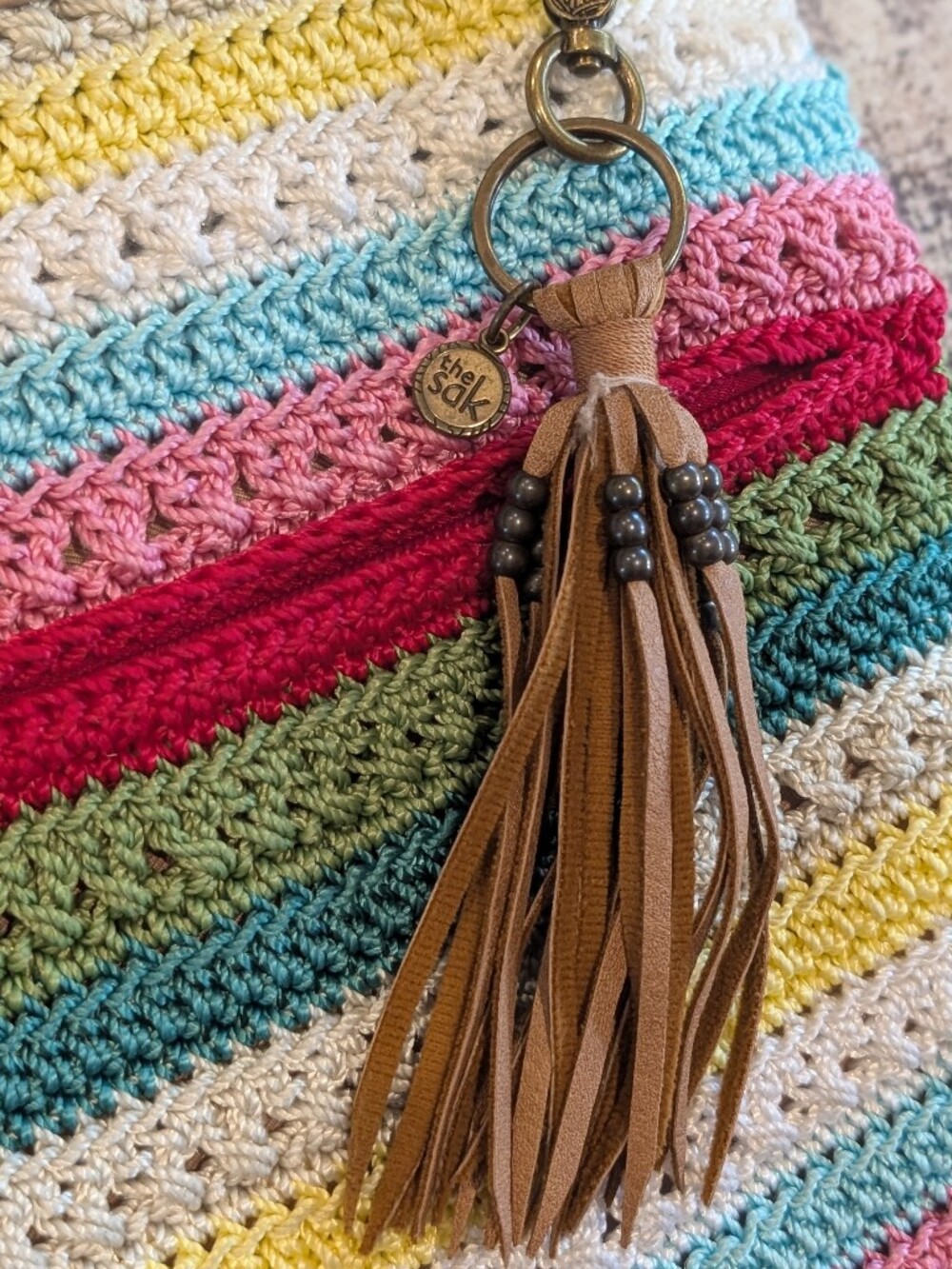 The Sak Rainbow Crochet Crossbody Purse w/ Faux Leather Zipper Pulls/Keychain